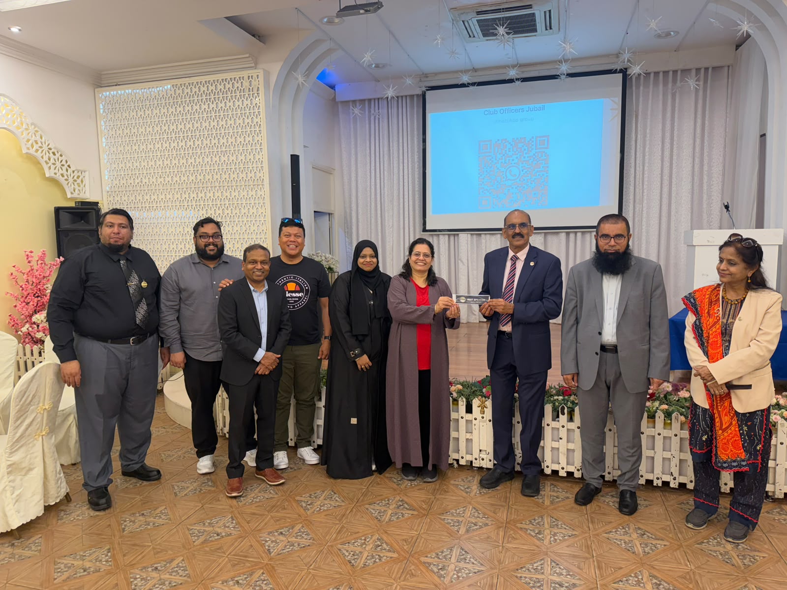 Global toastmasters club receiving a token from PQD DTM Omer